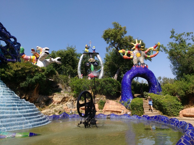 Niki de Saint Phalle's Tarot Garden - The Sun and The Hierophant in the forefront, photo by Sierra Nelson 